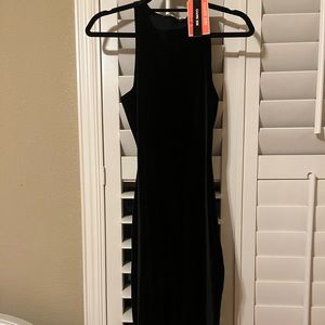 Gorgeous form-fitting, suede material, NWT Gianni Bini midi dress. Black Size XS